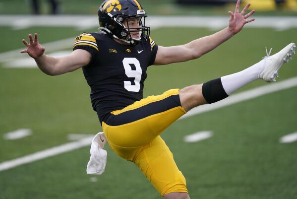 Punting Is Winning shirts symbolize No. 2 Hawkeyes season AP News